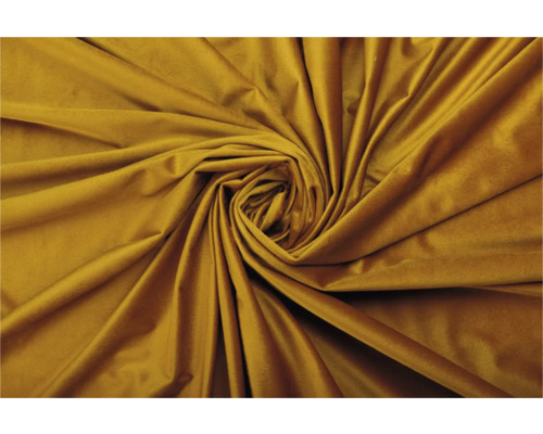 Țesătură de catifea aurie aranjată într-o spirală