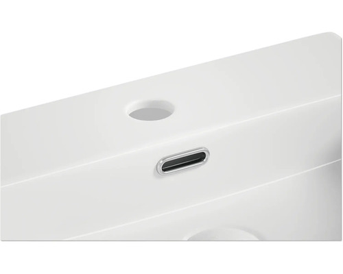 Vizualizare detaliată a unei chiuvete cu orificiu pentru robinet și preaplin