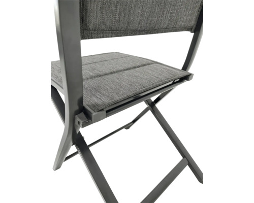 Imagine detaliată a unui scaun pliabil cu șezut și spătar tapițate