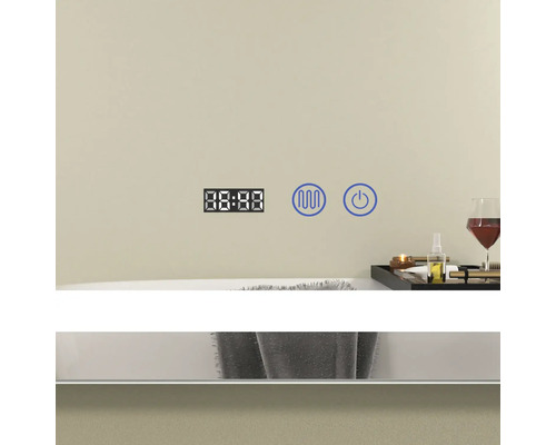 Afișaj digital, simbol val și buton de pornire/oprire pe o oglindă