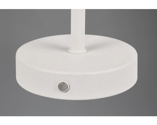 Prim-plan cu suport alb pentru umbrelă de soare, cu buton