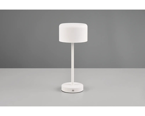 Lampă de masă albă cu abajur rotund.
