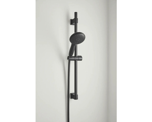 Bară de duș cu duș de mână pe un perete