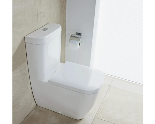 Toaletă albă de sine stătătoare cu suport pentru hârtie igienică