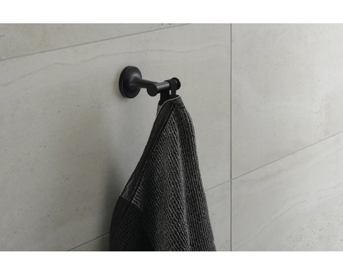 Suport de prosop cu prosop pe perete