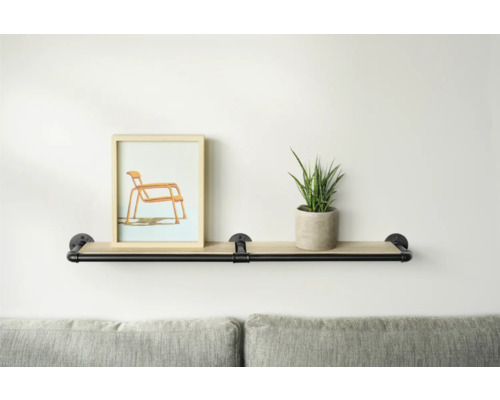 Raft de perete cu decorațiuni, constând dintr-o imagine și o plantă de interior