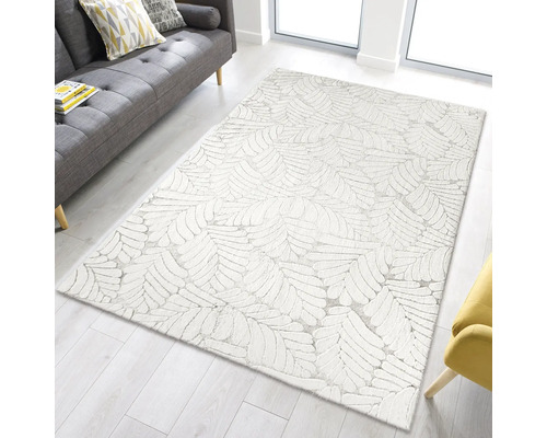Covor cu design de frunze într-un living luminos