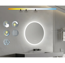 Oglindă rotundă cu iluminare LED pe un perete de baie cu chiuvetă și robinet, precum și simboluri pentru funcții.