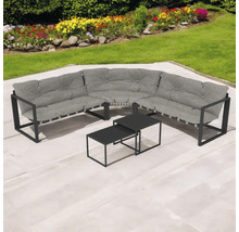 Set de mobilier de grădină cu canapea de colț și două mese pe o terasă