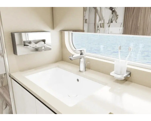 Baie modernă cu chiuvetă, robinet și dozator de săpun