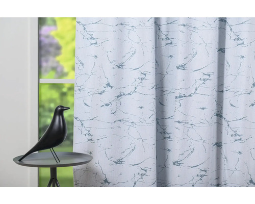 Șaluri decorative cu model de marmură și decorațiune cu pasăre pe o masă