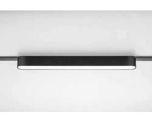 Spot negru pe șină pe tavan