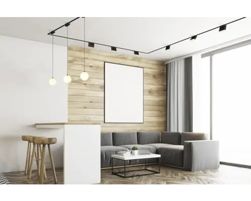 Living cu sistem de șine, spoturi, lămpi suspendate, canapea și scaune de bar