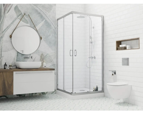 Baie modernă cu cabină de duș, lavoar cu oglindă și toaletă