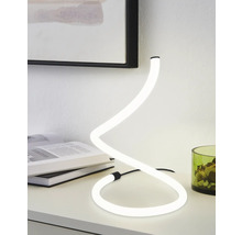 Lampă de masă decorativă cu LED în formă de spirală pe o masă