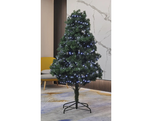 Brad artificial de Crăciun decorat cu iluminare