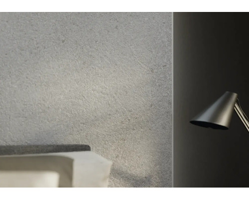 Prim-plan al unei plăci de perete gri cu o textură subtilă.