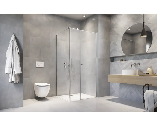 Baie luminoasă cu duș, chiuvetă, toaletă și oglindă pentru o ambianță modernă