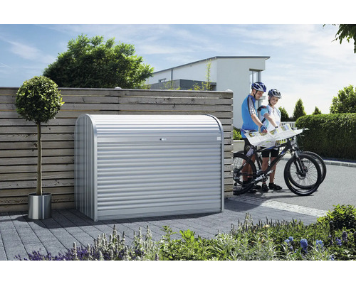 Magazie metalică de grădină cu oblon și două persoane cu biciclete