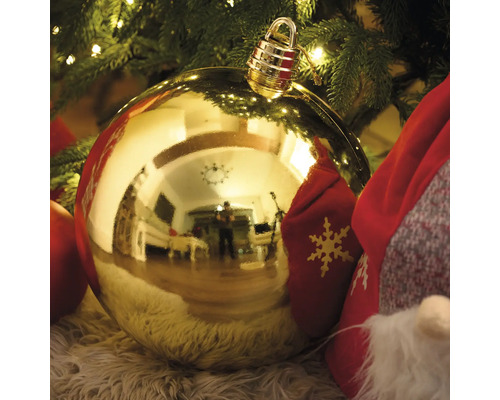 Glob de Crăciun auriu cu suport deasupra pomului de Crăciun