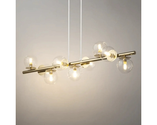 Lumină suspendată cu mai multe abajururi sferice transparente și element metalic drept, auriu.