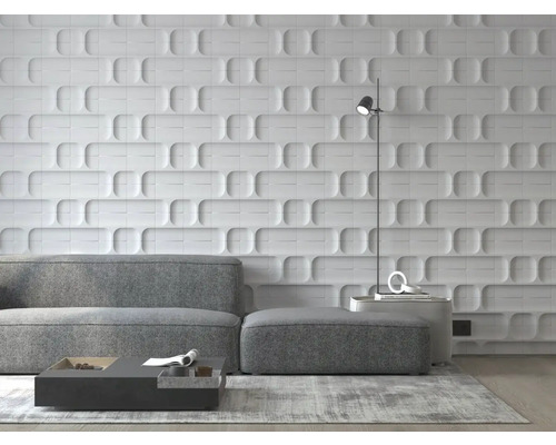 Living cu canapea gri, măsuță de cafea, lampadar și placare decorativă a peretelui.