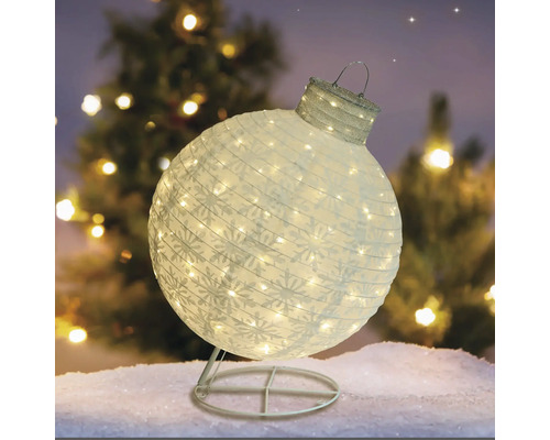 Glob decorativ de Crăciun, iluminat, cu model de fulgi de zăpadă pe un suport
