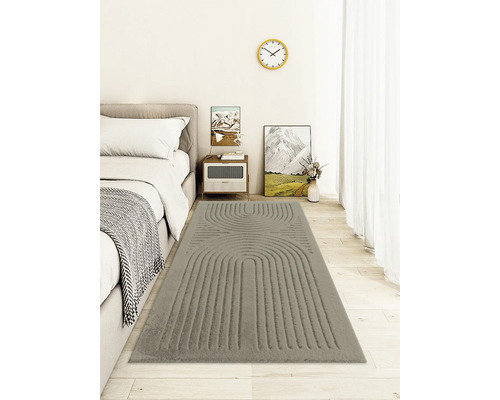 Dormitor cu pat și covor gri cu model