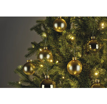 Prim-plan cu un pom de Crăciun cu globuri aurii și luminițe