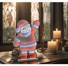 Figurină decorativă LED Moș Crăciun pe o masă