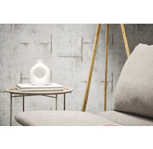 Tapetă decorativă cu aspect de beton și design de oțel de armare în camera de zi.