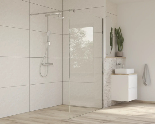 Duș walk-in cu baterie de duș și chiuvetă într-o baie modernă