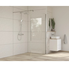 Baie modernă cu cabină de duș, lavoar așezat pe blat și baterie de perete