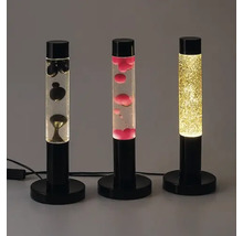 Trei lămpi de lavă cu umpluturi diferite pe o masă.