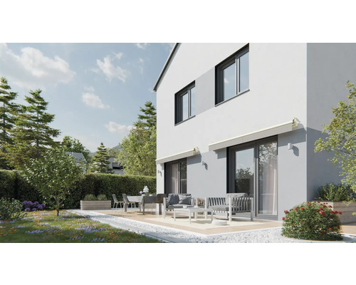 Casă modernă cu terasă și mobilier de grădină