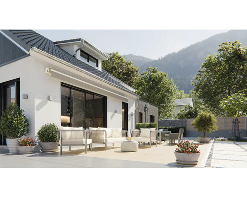 Casă cu terasă, mobilier de grădină și vedere la munte
