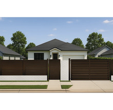 Vedere a casei cu gard și poartă moderne