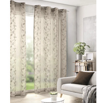 Perdea cu imprimeu de frunze în camera de zi