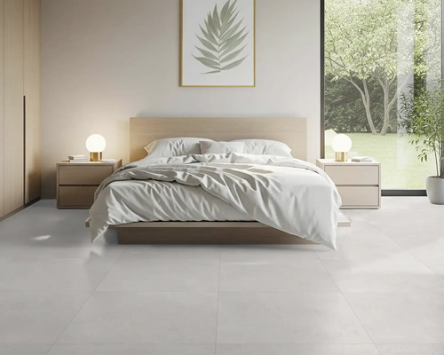 Dormitor cu pat, noptiere și podea cu gresie