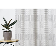 Material decorativ cu model grafic și plantă de interior