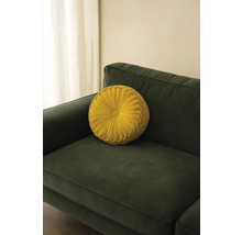 Pernă decorativă rotundă pe o canapea