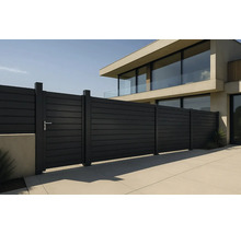 Împrejmuire modernă a proprietății cu poartă și elemente de gard în fața unei case