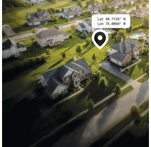 Vedere aeriană a unei zone rezidențiale cu case, grădini și străzi