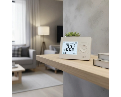 Termostat digital de cameră pe un raft într-un living pentru controlul temperaturii.