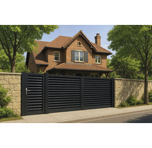 Poartă glisantă din aluminiu în fața unei case cu zid de piatră