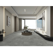 Living luminos cu televizor, măsuță de cafea și operă de artă