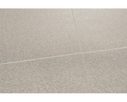 Gresie porțelanată cu aspect de material textil și model spic.