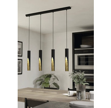 Lumină suspendată cu patru lămpi deasupra unei mese de sufragerie