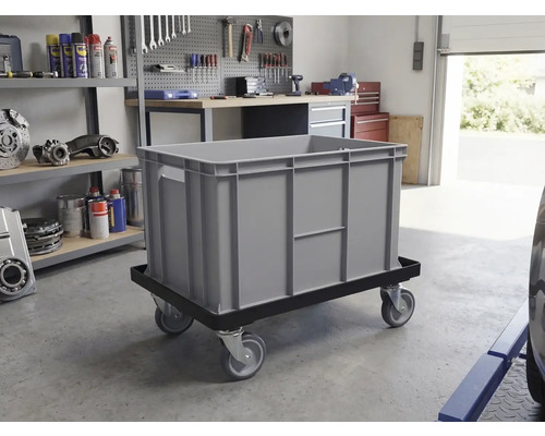 Recipient de depozitare gri pe o placă cu rotile într-un atelier.