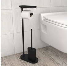 Set de toaletă stativ cu suport hârtie igienică, raft și perie de toaletă într-o baie luminoasă și modernă lângă vasul de toaletă.